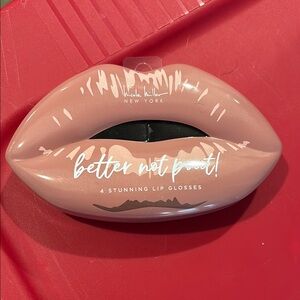 Nicole MillerCream Lip Balm Gloss for a Polished Look